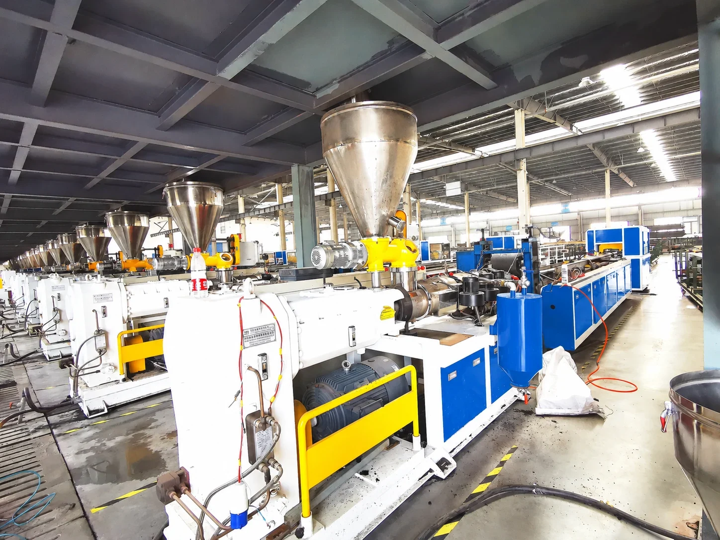 Hoppers and blue-and-white WPC extrusion equipment