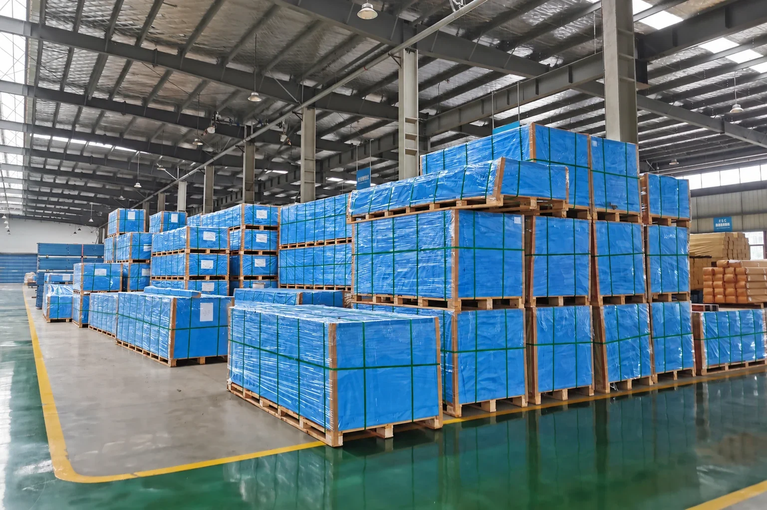 Packed composite product pallets stored in a warehouse