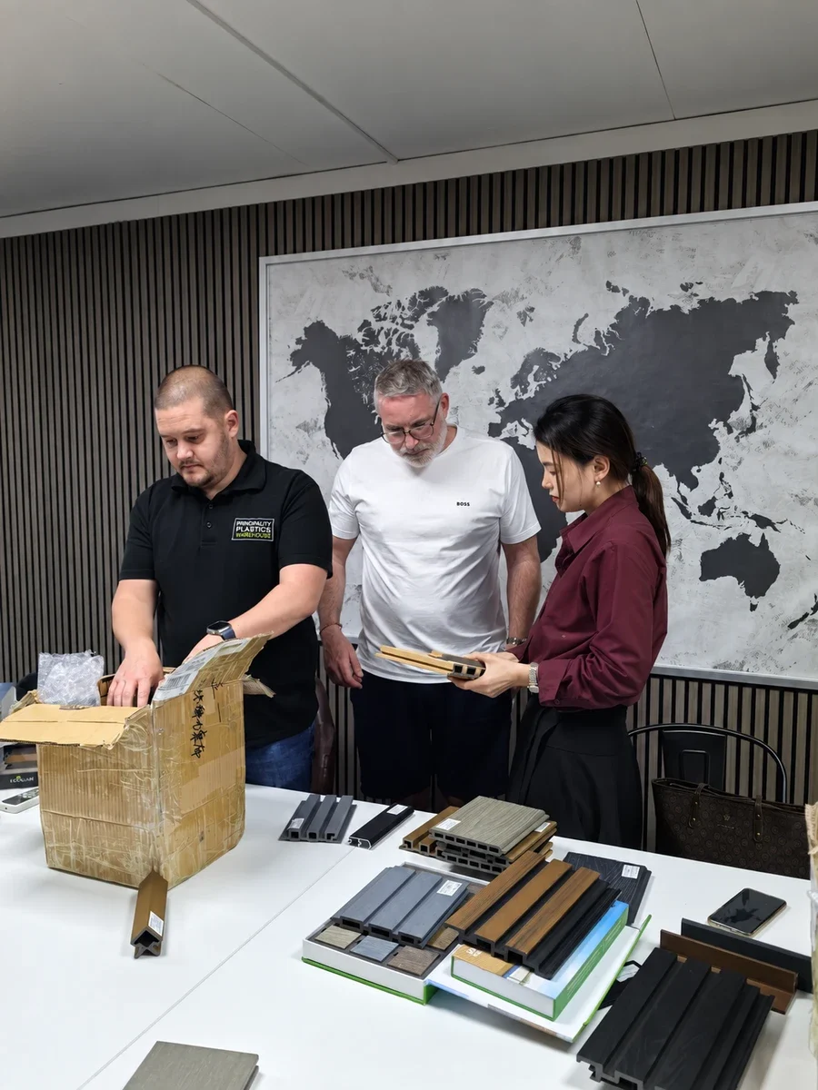 Reviewing product samples together around a meeting table