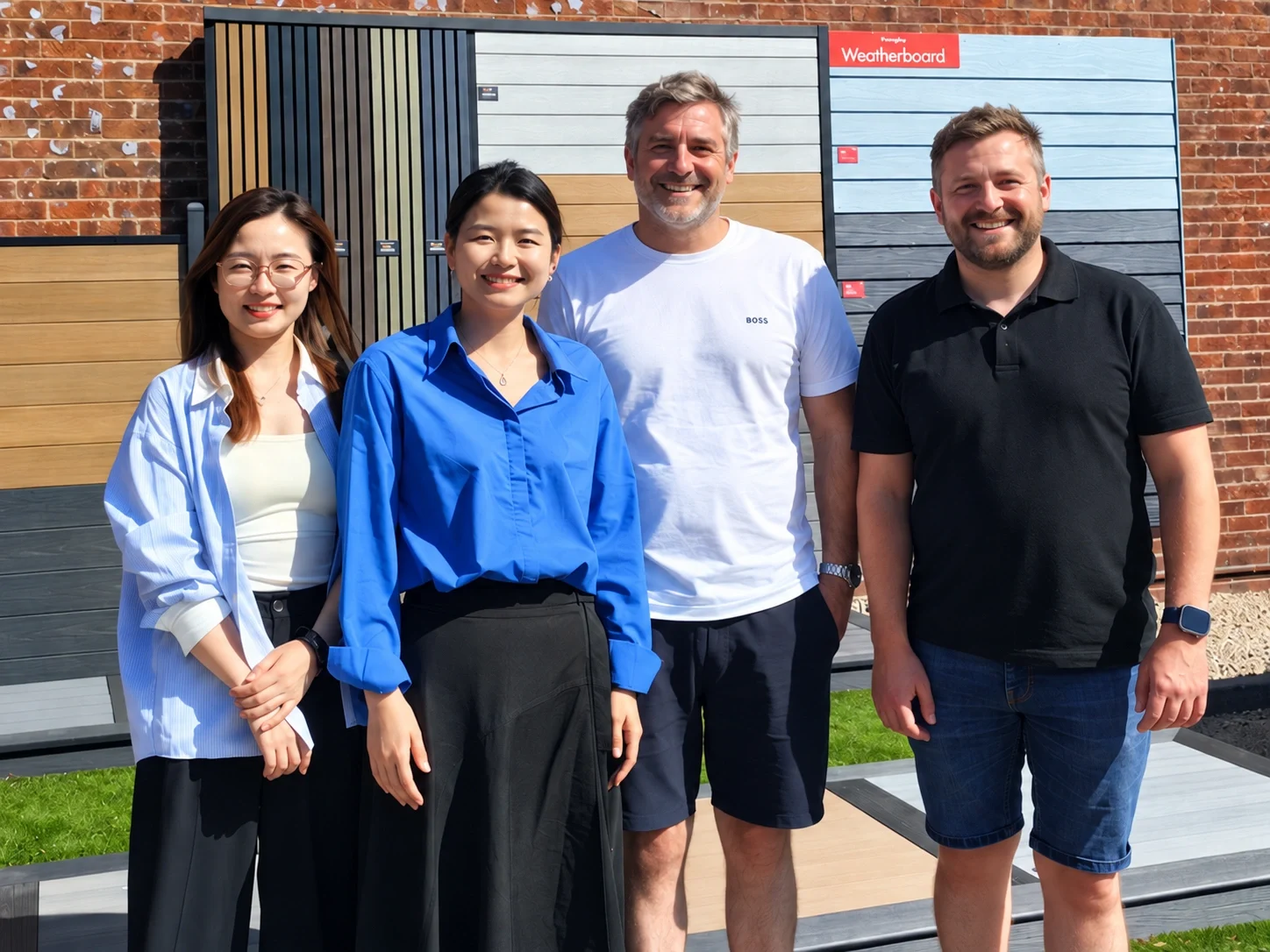 Customer visit beside outdoor decking and cladding displays